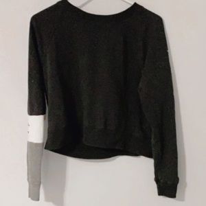 this is a grey, black, and white hollister croptop